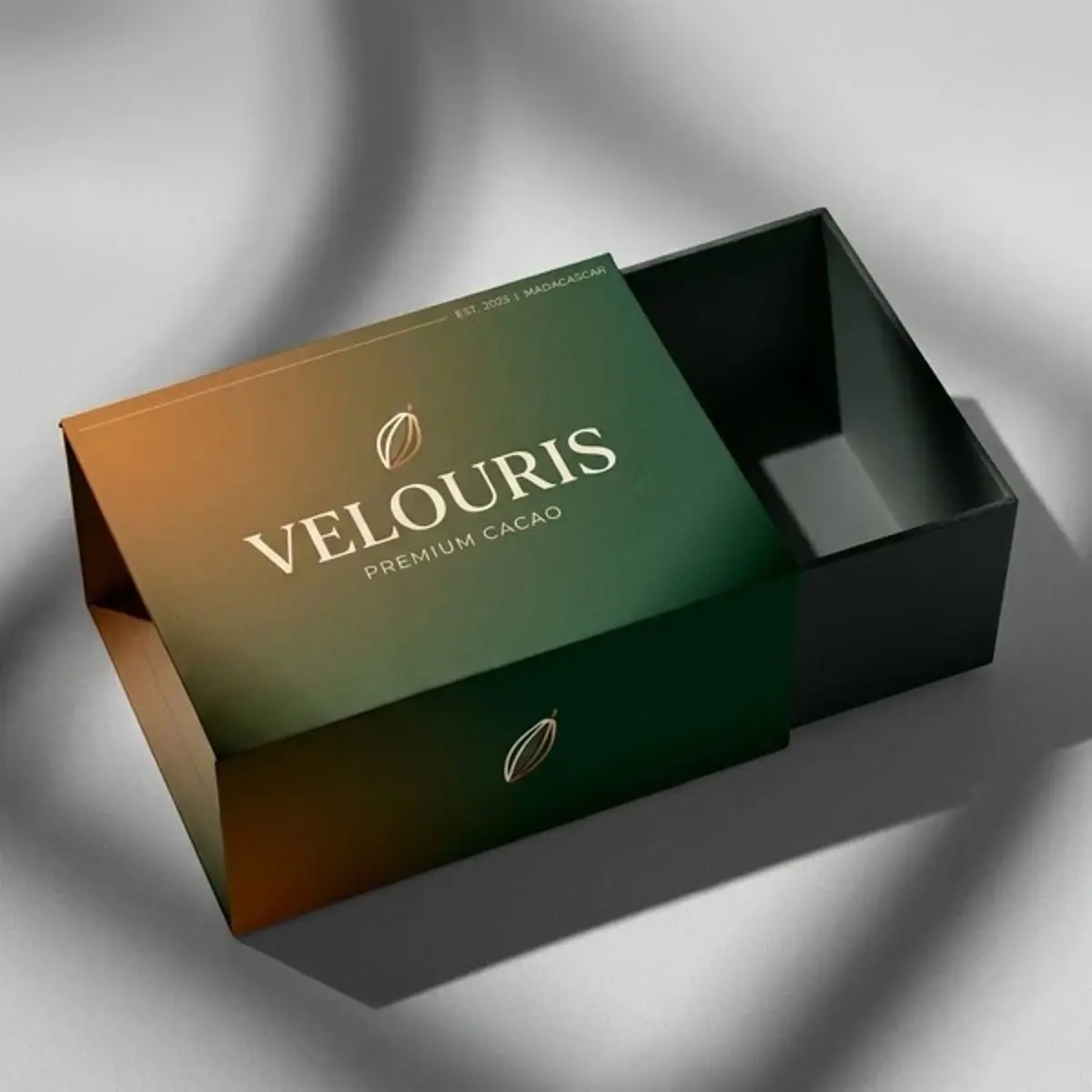 Wrapped rigid gift boxes with magnetic closure and foil stamped logo