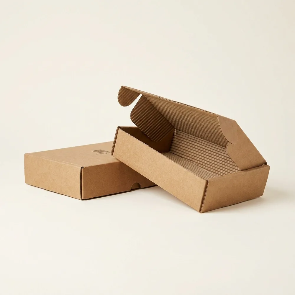 Natural brown kraft boxes with single-colour logo print